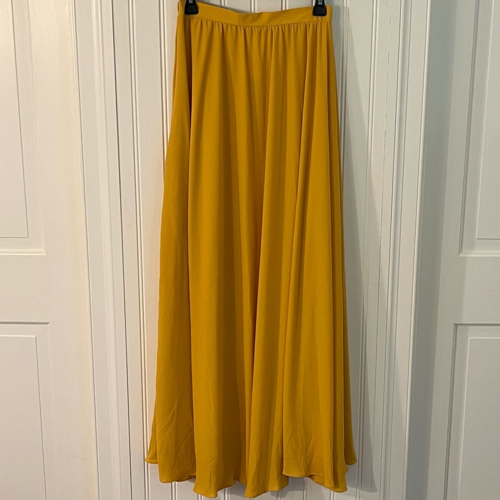 Long yellow flowy skirt